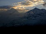 04 Dhaukagiri And Tukuche Peak Before Sunset From Kharka On Way To Mesokanto La Clouds slightly parted at sunset revealing Dhaulagiri and Tukuche Peak from our camp on the kharka (3460m) above Jomsom on the way to Tilicho Lake.